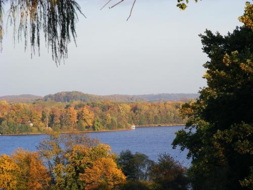 a view of a lake in the fall at Bellevue in Malente