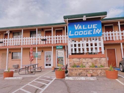 a building with a sign that reads valley edge inn at Value Lodge Inn in Delta