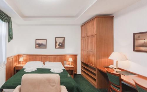Postel nebo postele na pokoji v ubytování Hotel Peko