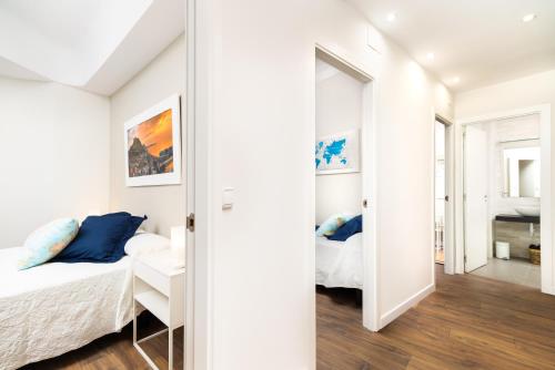 A bed or beds in a room at La Casa de los Mapas
