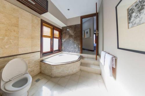 Een badkamer bij Villa Simone Bali