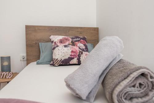 Katil atau katil-katil dalam bilik di Apartmani DMarie