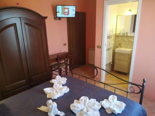TV a/nebo společenská místnost v ubytování le stanze della Terrazza sul Borgo