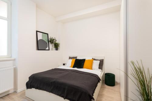 Postel nebo postele na pokoji v ubytování Stylish Flat in Nusle by Prague Days