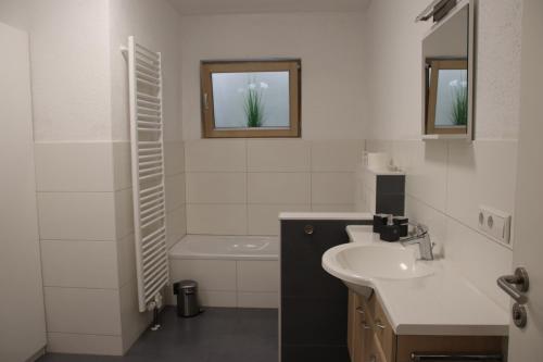 Ванна кімната в Ferienwohnung Limespark am See