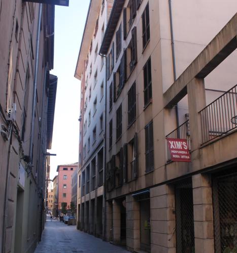 an empty alley in a city with buildings at SENTIR VIC in Vic