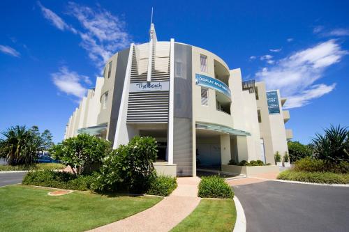 a large white building with a street in front of it at The Beach Cabarita in Cabarita Beach