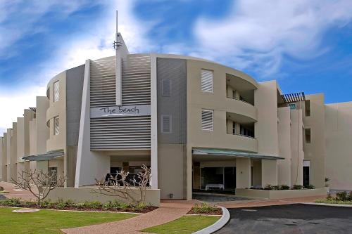 a building with a cross on the front of it at The Beach Cabarita in Cabarita Beach
