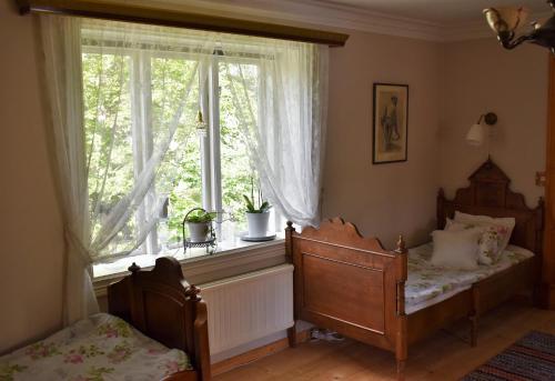 Postel nebo postele na pokoji v ubytování Esperöd Farm