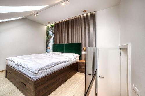 Posteľ alebo postele v izbe v ubytovaní Apartment Tiliana