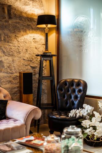 Coin salon dans l'établissement La Locanda Del Conte Mameli