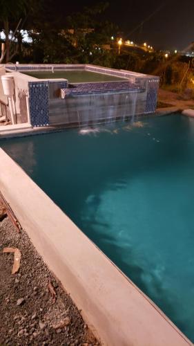 The swimming pool at or close to CASTLE VIEW VILLA