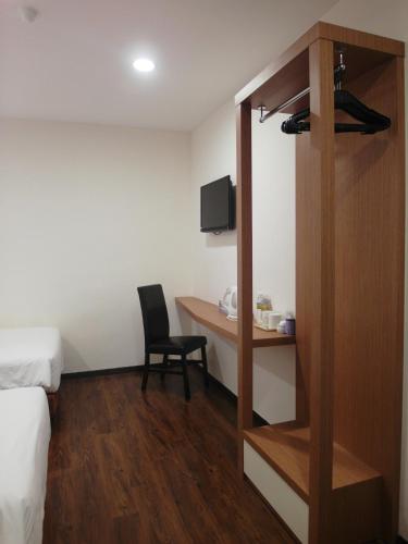 TV a/nebo společenská místnost v ubytování Nagoya Inn Hotel