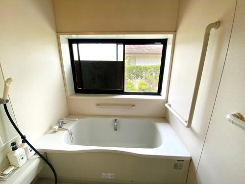 Un baño de Yufuin Onsen Hasuwa Inn