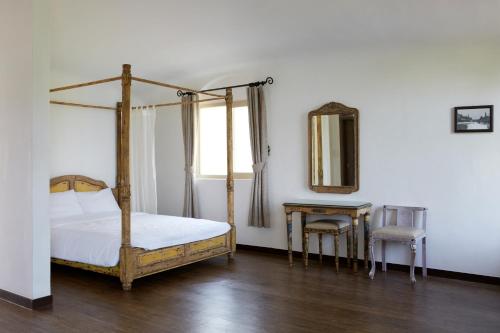 Katil atau katil-katil dalam bilik di Club ES Tongyeong Resort