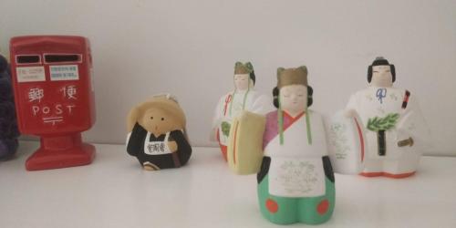 a group of toy figurines of people in japan at Duplex Itri in Itri