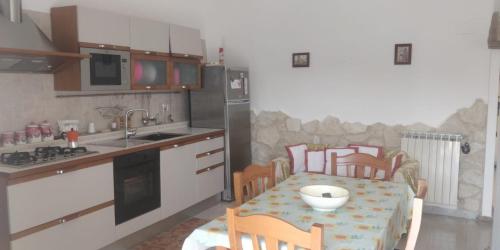 Kuchyň nebo kuchyňský kout v ubytování Duplex Itri