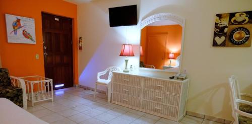 Et badeværelse på Aruba Quality Apartments & Suites