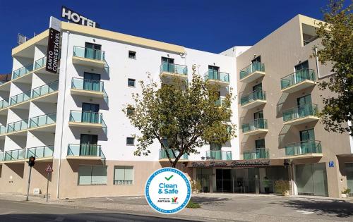 a hotel building with a sign in front of it at Hotel Santo Condestavel in Fátima