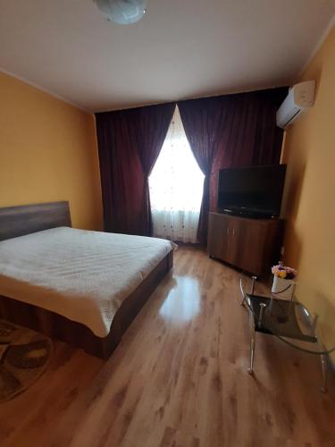 Ένα ή περισσότερα κρεβάτια σε δωμάτιο στο Casa Horea