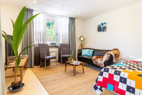 Posezení v ubytování Roselle Appartement Gennep