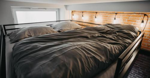 Llit o llits en una habitació de Little Home