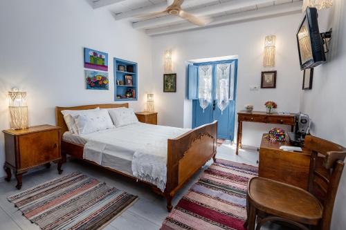 Ліжко або ліжка в номері The Aegean blue country house Old Milos