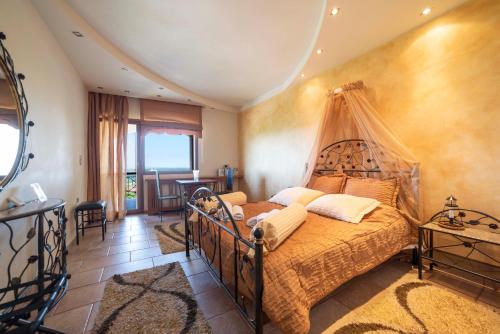 Postel nebo postele na pokoji v ubytování Hotel Erodios