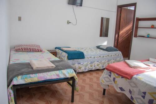 Katil atau katil-katil dalam bilik di Casa do Juá