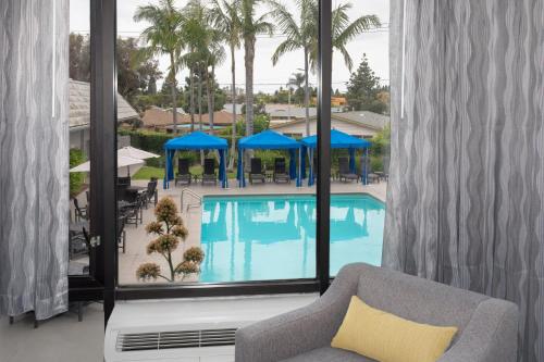 a view of a swimming pool from a hotel room at Crowne Plaza Costa Mesa Orange County, an IHG Hotel in Costa Mesa