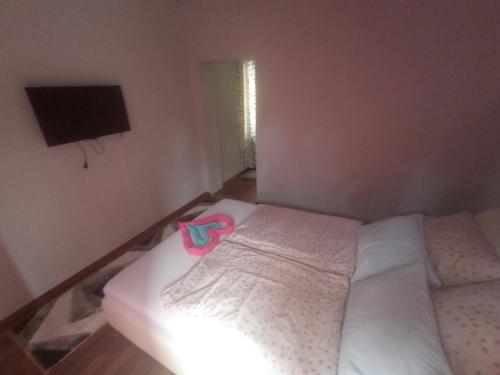 Katil atau katil-katil dalam bilik di Apartmani Lana