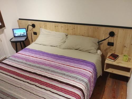 Postel nebo postele na pokoji v ubytování B&B Mirò
