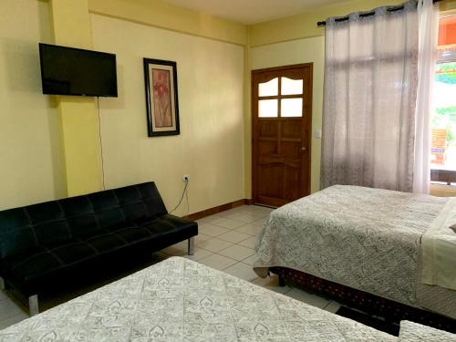 Postel nebo postele na pokoji v ubytování Hotel-Villas JABEL TINAMIT