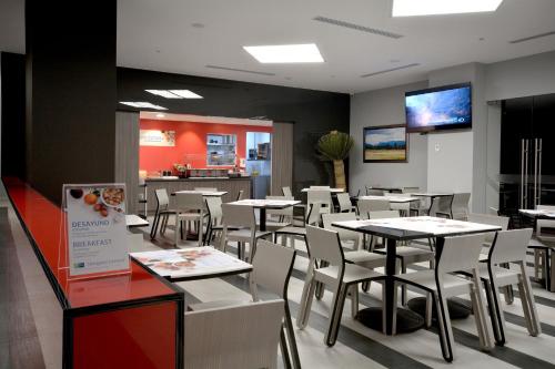 TV o dispositivi per l'intrattenimento presso Holiday Inn Express Pachuca by IHG