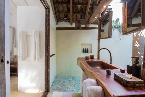 Ванная комната в UXUA Casa Hotel & Spa