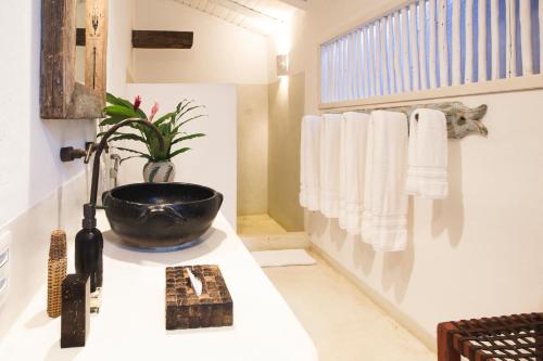 Ванная комната в UXUA Casa Hotel & Spa