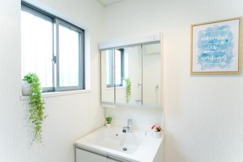 Um banheiro em Yokkaichi Hazunaka Hotel
