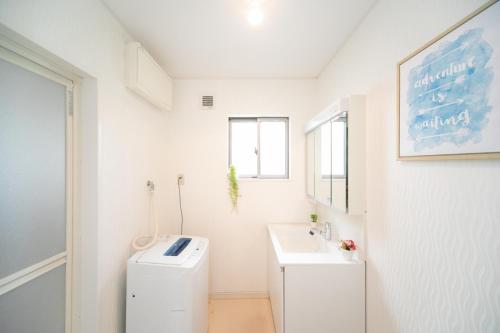 Bathroom sa Yokkaichi Hazunaka Hotel
