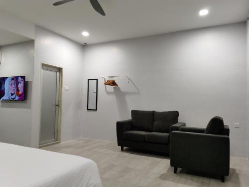 TV a/nebo společenská místnost v ubytování L Hotel