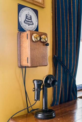 a room with a door with two rings on the wall at The Mulberry Inn -An Historic Bed and Breakfast in St. George