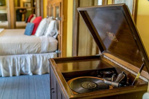 a bathroom with a wooden sink in a room at The Mulberry Inn -An Historic Bed and Breakfast in St. George