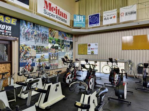 a gym with a bunch of bikes in a room at YUKUSA OHSUMI UMI no GAKKO in Kanoya