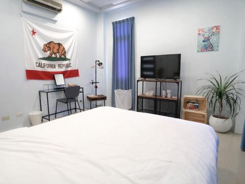 Ένα ή περισσότερα κρεβάτια σε δωμάτιο στο Rightday Inn
