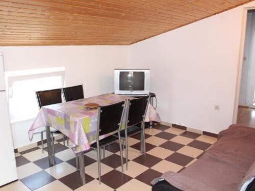 TV a/nebo společenská místnost v ubytování Apartments Šiša