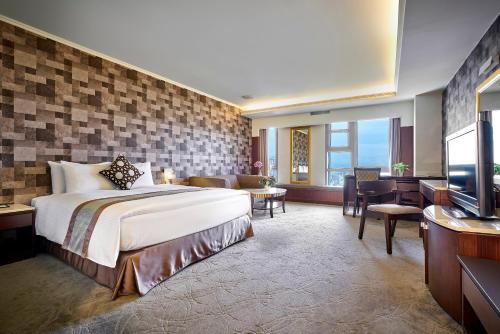 Ένα ή περισσότερα κρεβάτια σε δωμάτιο στο Zhong Ke Hotel