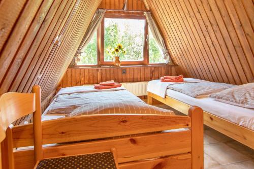 Ein Bett oder Betten in einem Zimmer der Unterkunft Das DÜNENHAUS
