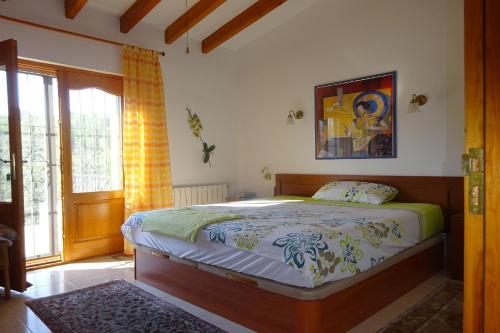 Postel nebo postele na pokoji v ubytování Villa Aurora