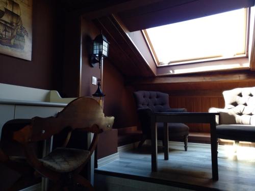 Χώρος καθιστικού στο Hostal Medievo