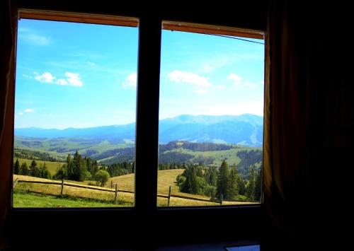 a view from a window of a mountain view at Monte Vista in Rostoka