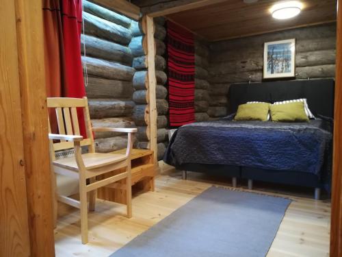 Postel nebo postele na pokoji v ubytování Chalet Tunturipöllö